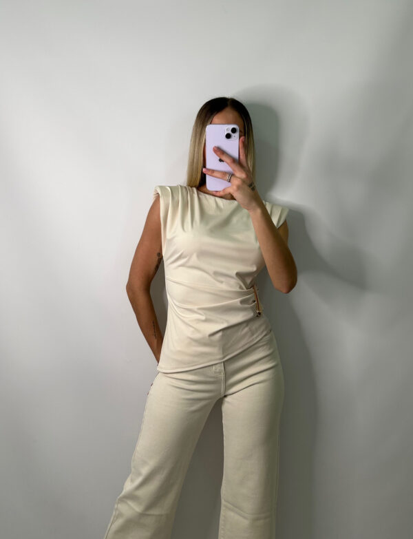 Top asimétrico beige