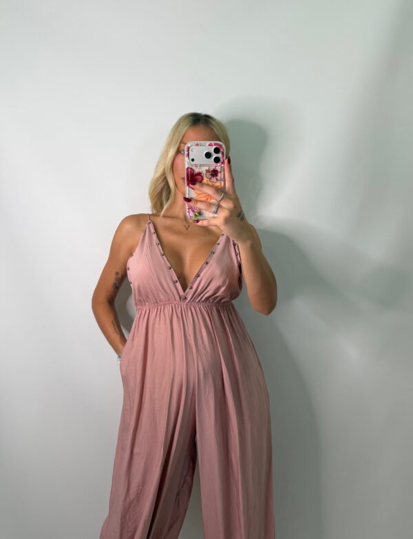 Mono Mariela rosa empolvado
